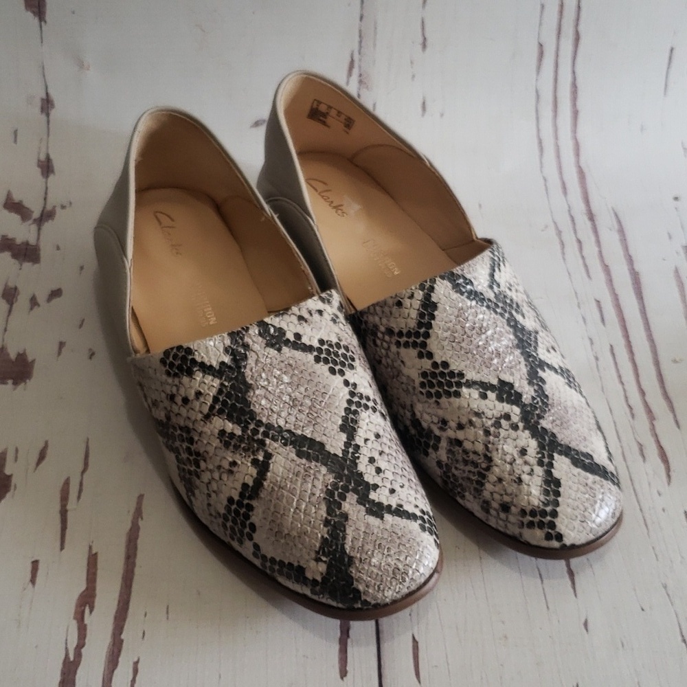 Clarks Snakeskin-Patterned Slip-On Loafers in Beige and Black.